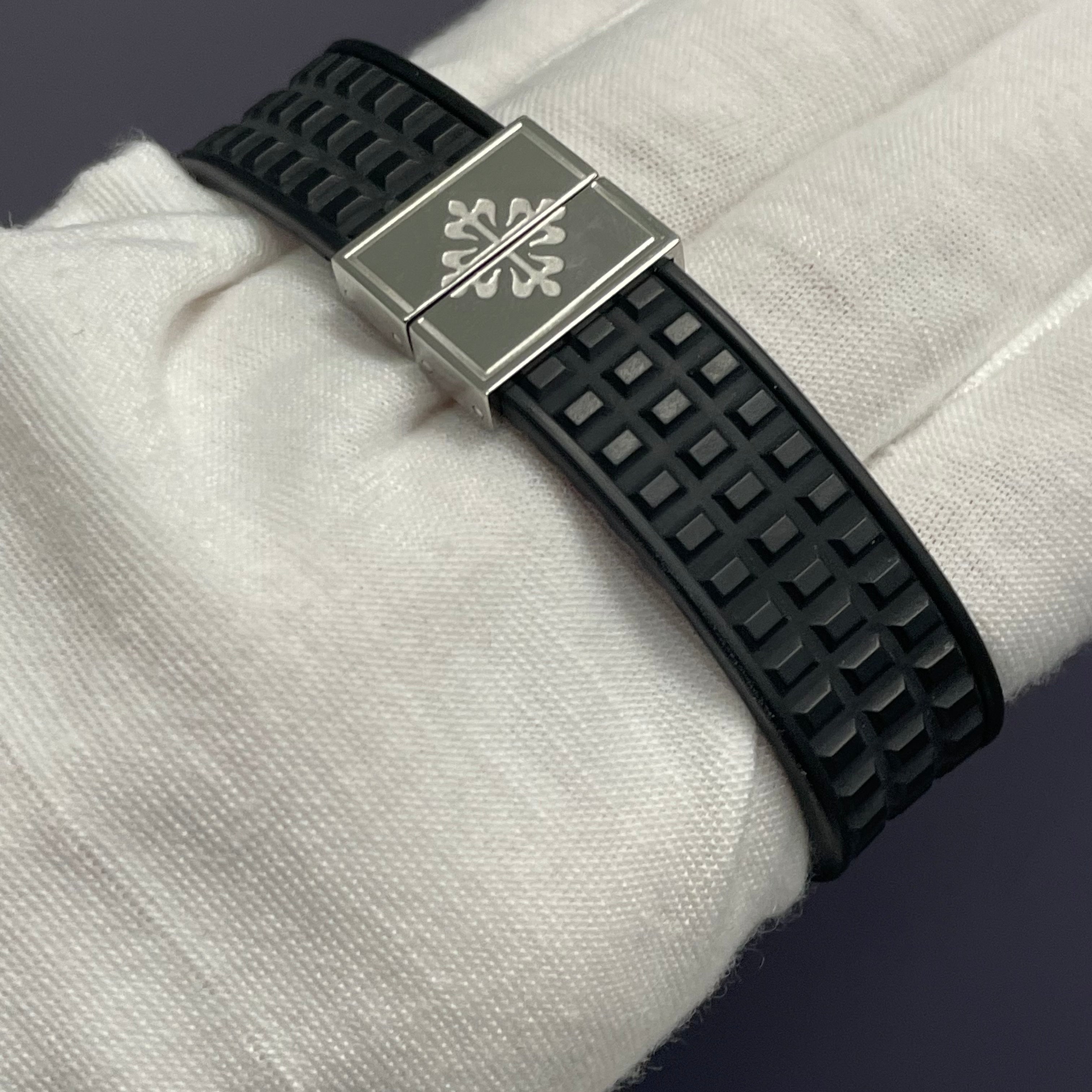 Patek Philippe Aquanaut 28mm Black Dial Watch Ref# 4961A-001 - Happy Jewelers Fine Jewelry Lifetime Warranty