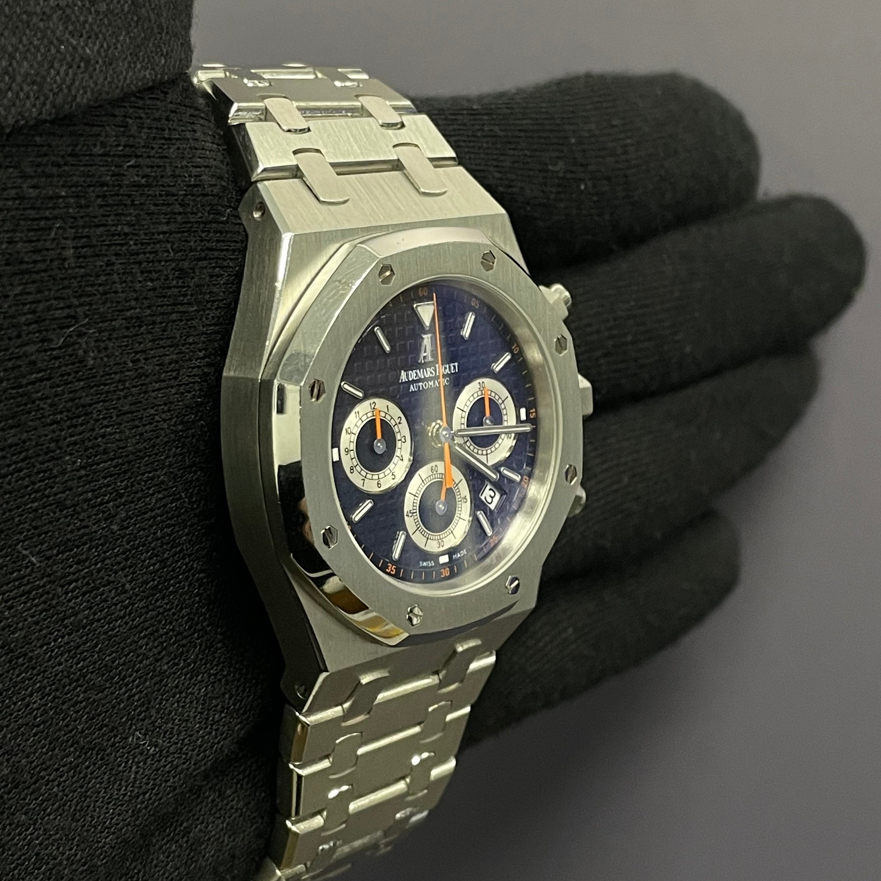 Audemars Piguet Royal Oak 39mm Blue Dial Watch Ref# 26300ST.OO.1110ST.07 - Happy Jewelers Fine Jewelry Lifetime Warranty