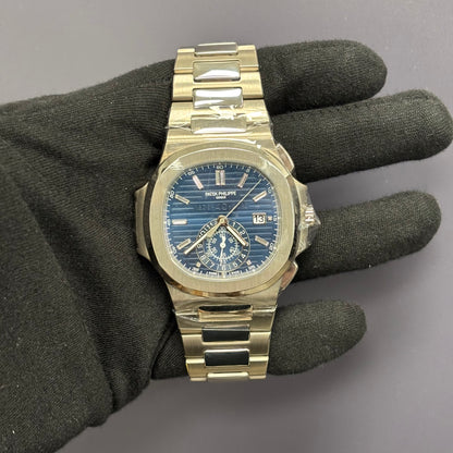 Patek Philippe Nautilus 44mm Blue Dial Watch Ref# 5976/1G-001 - Happy Jewelers Fine Jewelry Lifetime Warranty