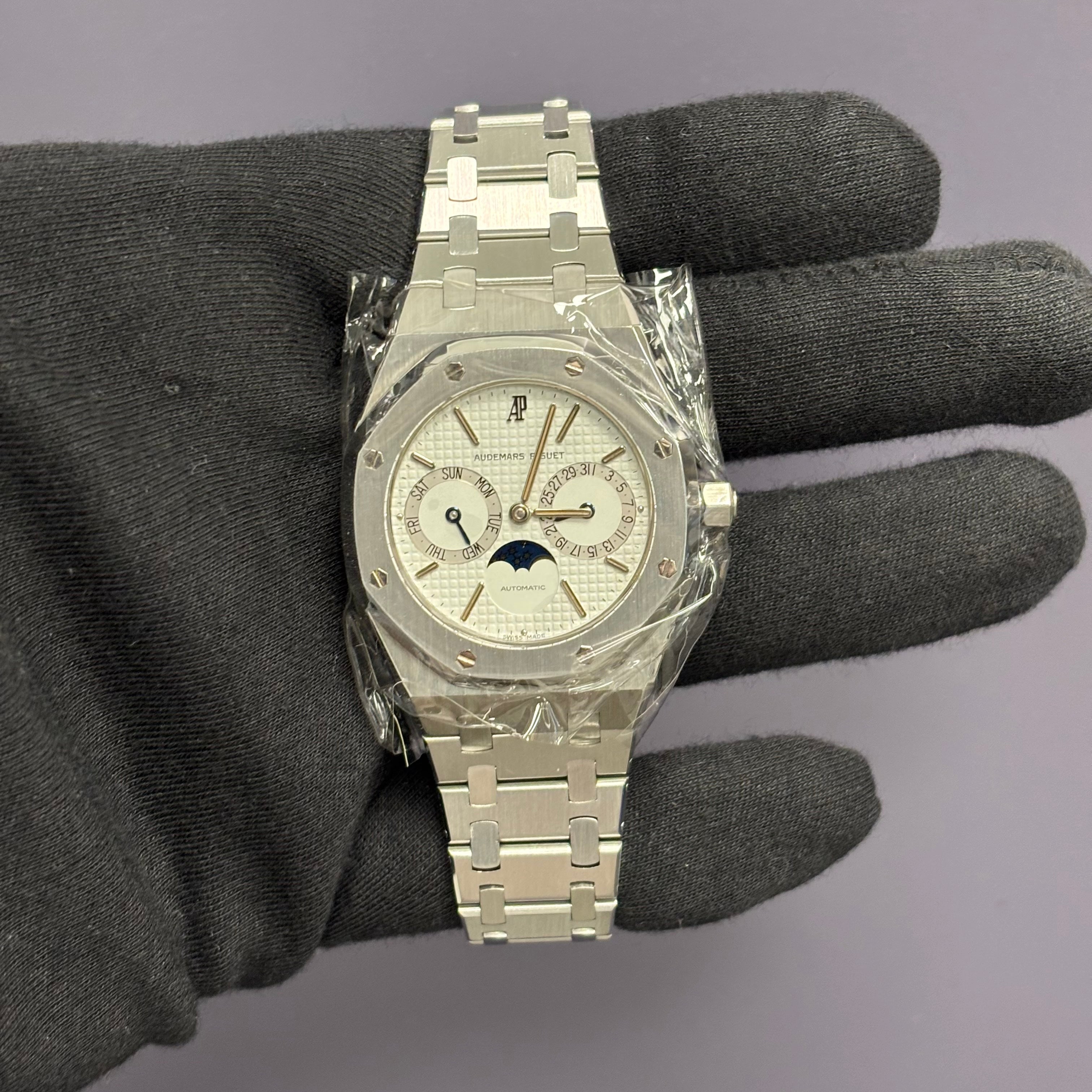 Audemars Piguet Royal Oak 36mm White Dial Watch Ref# 25594ST.OO.0789ST.05 - Happy Jewelers Fine Jewelry Lifetime Warranty