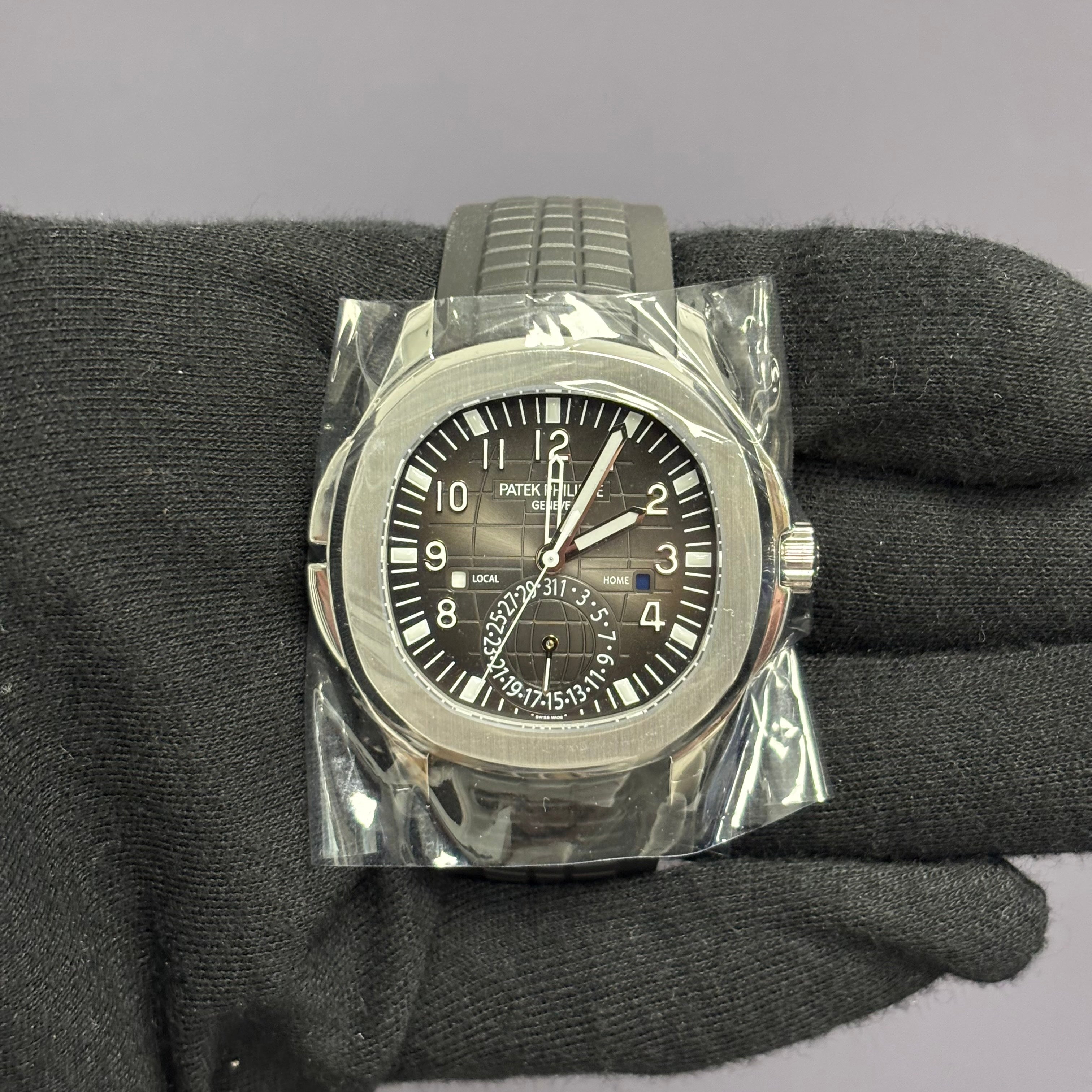 Patek Philippe Aquanaut 40mm Grey Dial Watch Ref# 5164A-001 - Happy Jewelers Fine Jewelry Lifetime Warranty