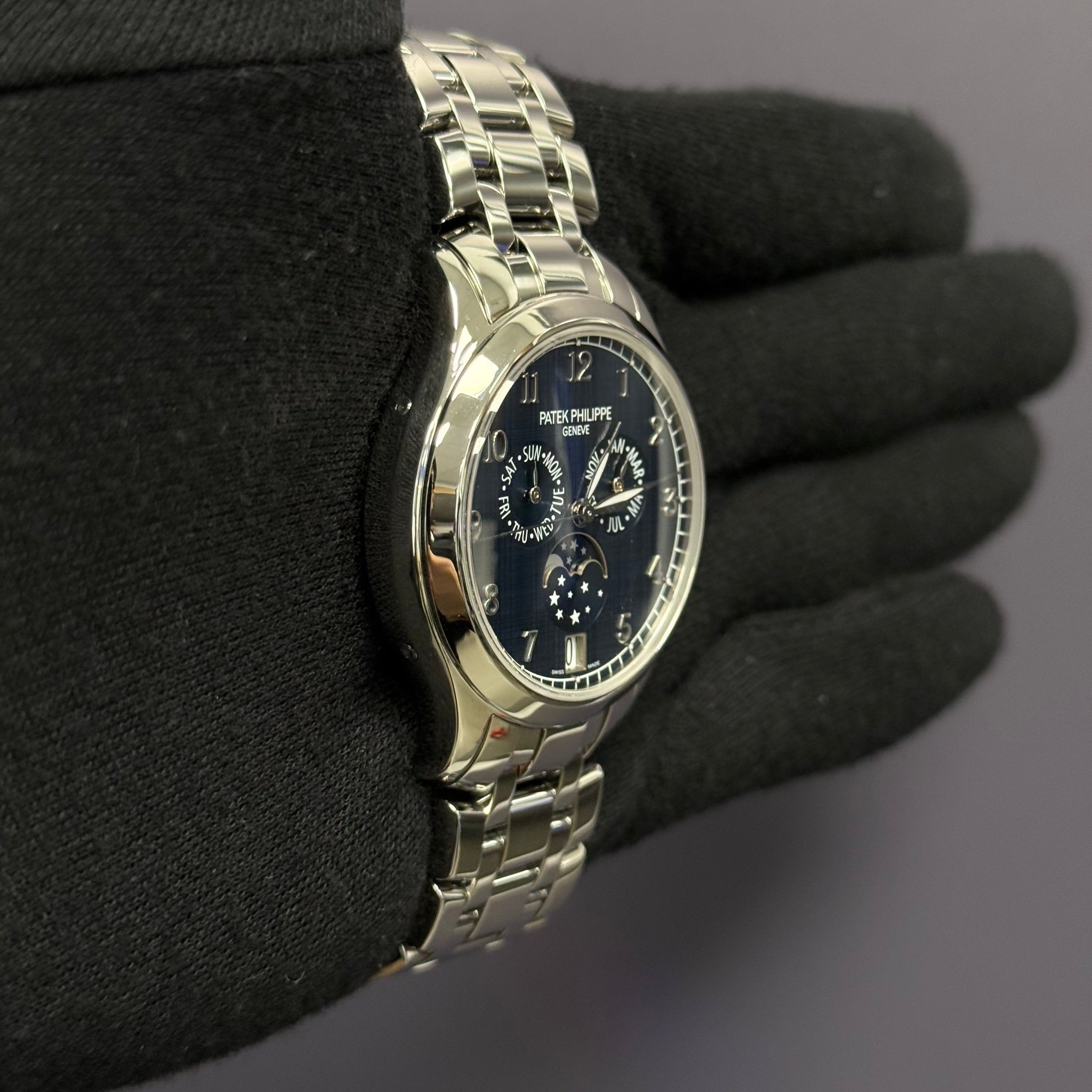 Patek Philippe Complications 38mm Blue Dial Watch Ref# 4947/1A-001 - Happy Jewelers Fine Jewelry Lifetime Warranty