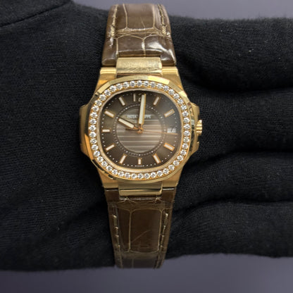 Patek Philippe Nautilus 32mm Brown Dial Watch Ref# 7010R/010 - Happy Jewelers Fine Jewelry Lifetime Warranty