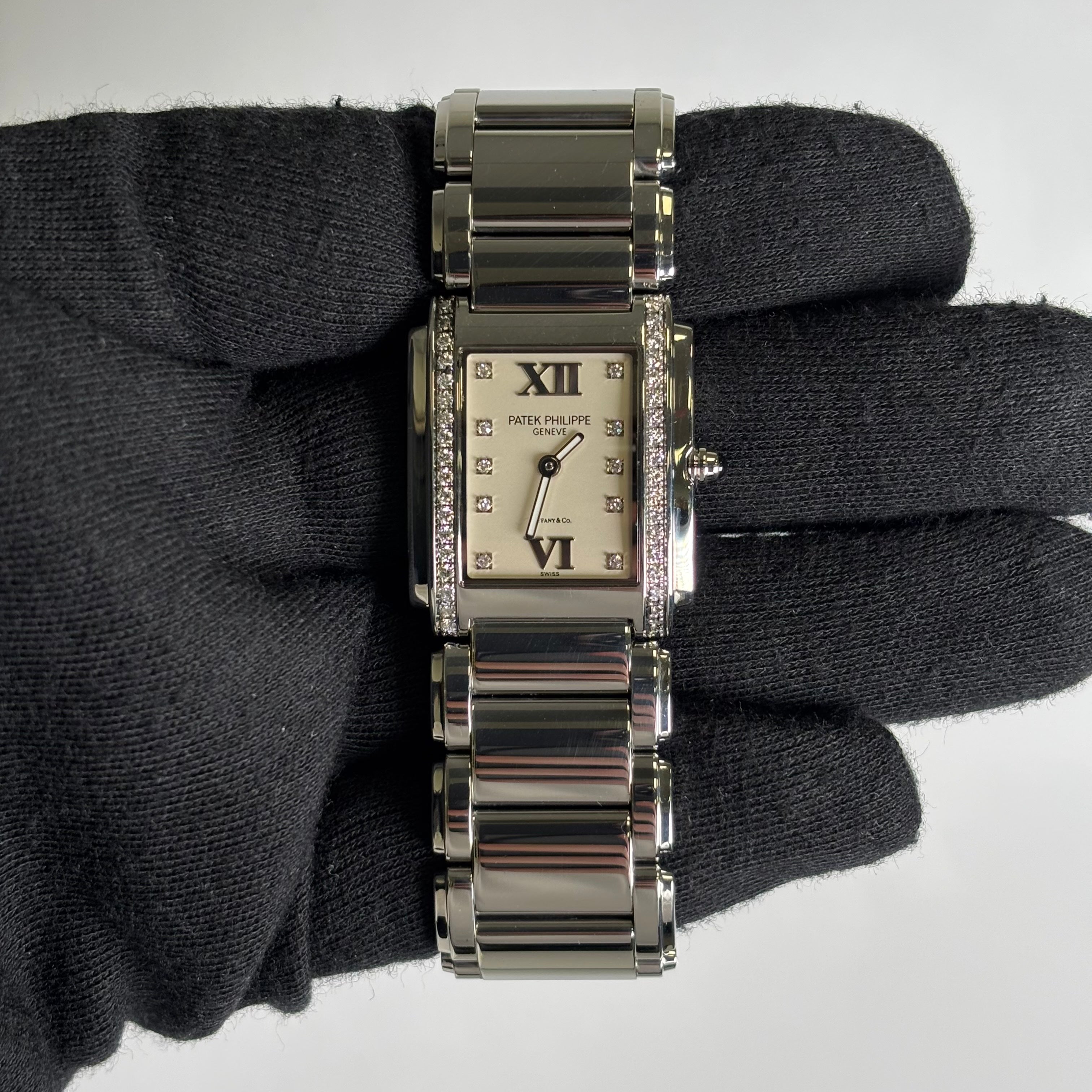 Patek Philippe Twenty-4 TIFFANY & CO. 25mm White Dial Watch Ref# 4910/10A-011 - Happy Jewelers Fine Jewelry Lifetime Warranty