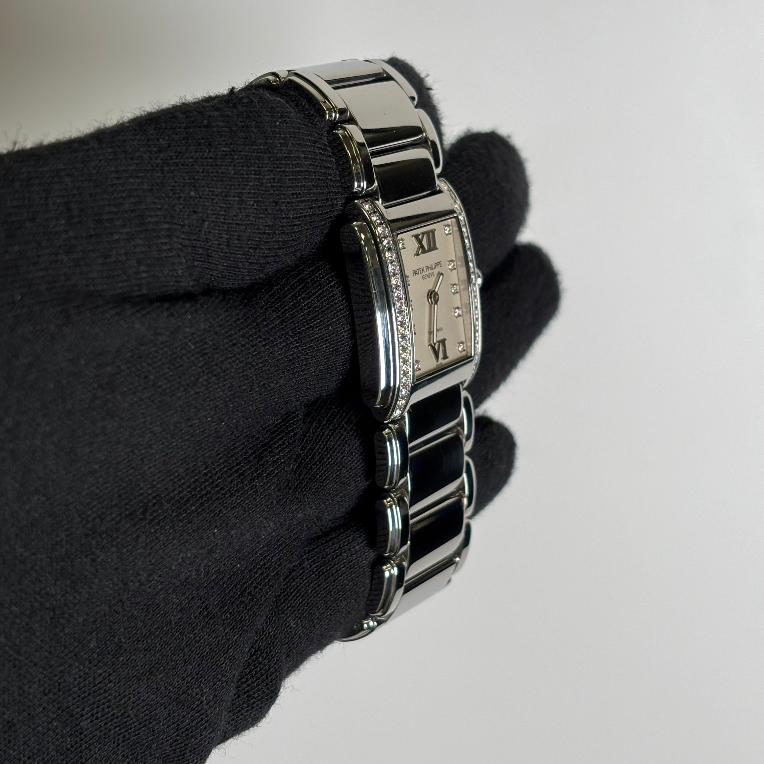 Patek Philippe Twenty-4 TIFFANY & CO. 25mm White Dial Watch Ref# 4910/10A-011 - Happy Jewelers Fine Jewelry Lifetime Warranty