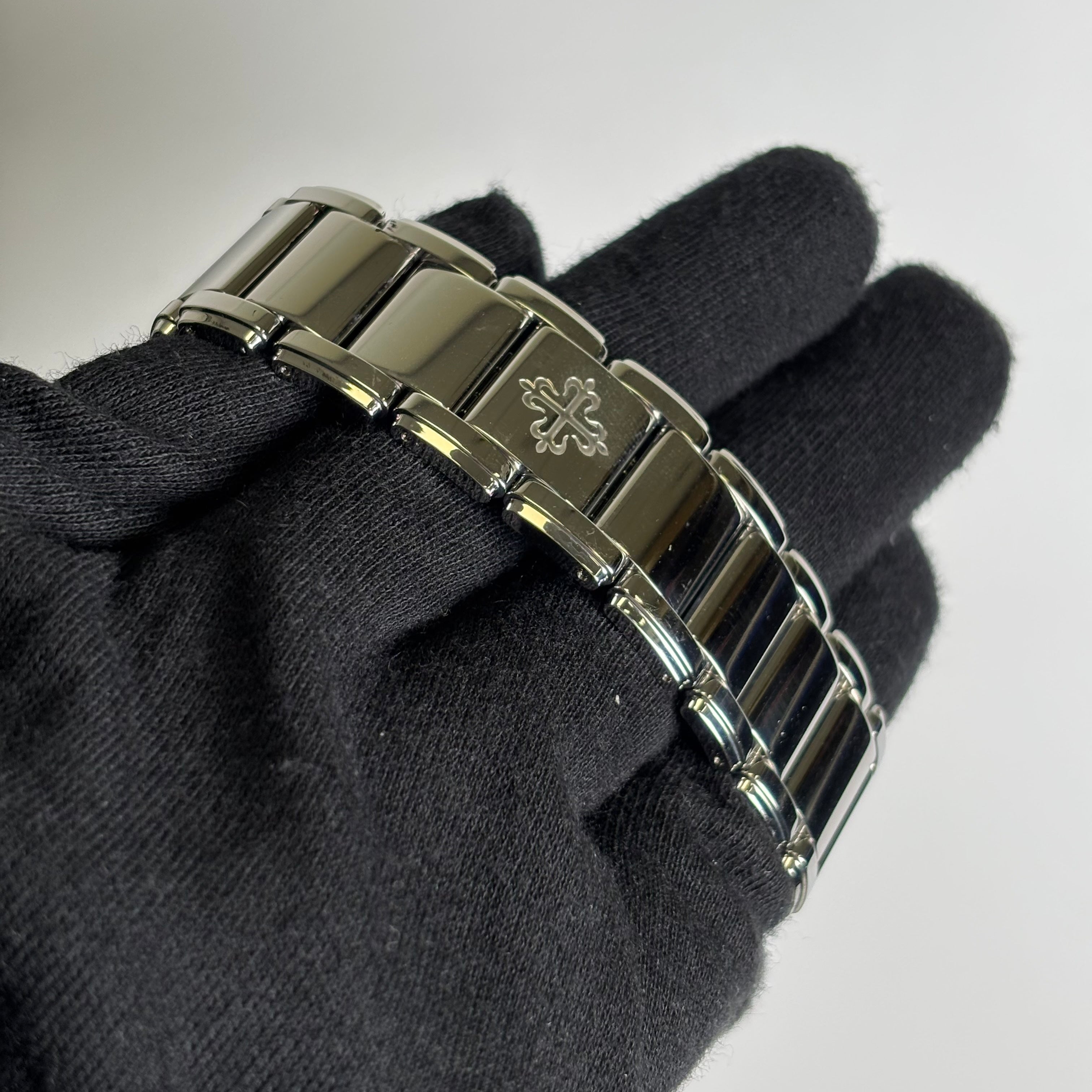 Patek Philippe Twenty-4 TIFFANY & CO. 25mm White Dial Watch Ref# 4910/10A-011 - Happy Jewelers Fine Jewelry Lifetime Warranty