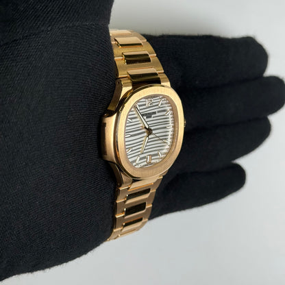 Patek Philippe Nautilus 35mm Silver Dial Watch Ref# 7118/1R-001 - Happy Jewelers Fine Jewelry Lifetime Warranty