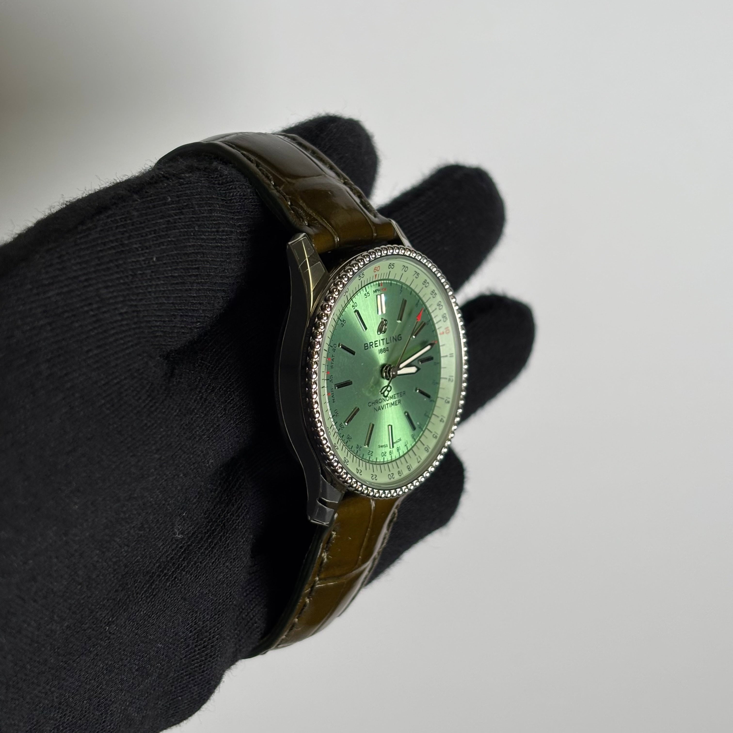 Breitling Navitimer 35mm Green Dial Watch Ref# A17395 - Happy Jewelers Fine Jewelry Lifetime Warranty