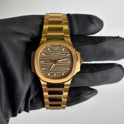 Patek Philippe Nautilus 35mm Champagne Dial Watch Ref# 7118/1R-010 - Happy Jewelers Fine Jewelry Lifetime Warranty