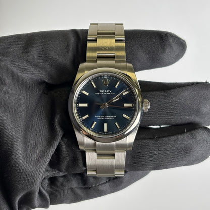 Rolex Oyster Perpetual 34mm Blue Dial Watch Ref# 124200 - Happy Jewelers Fine Jewelry Lifetime Warranty
