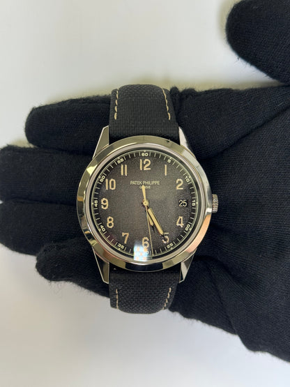 Patek Philippe Calatrava Charcoal Dial Watch Ref# 5226G-001 - Happy Jewelers Fine Jewelry Lifetime Warranty