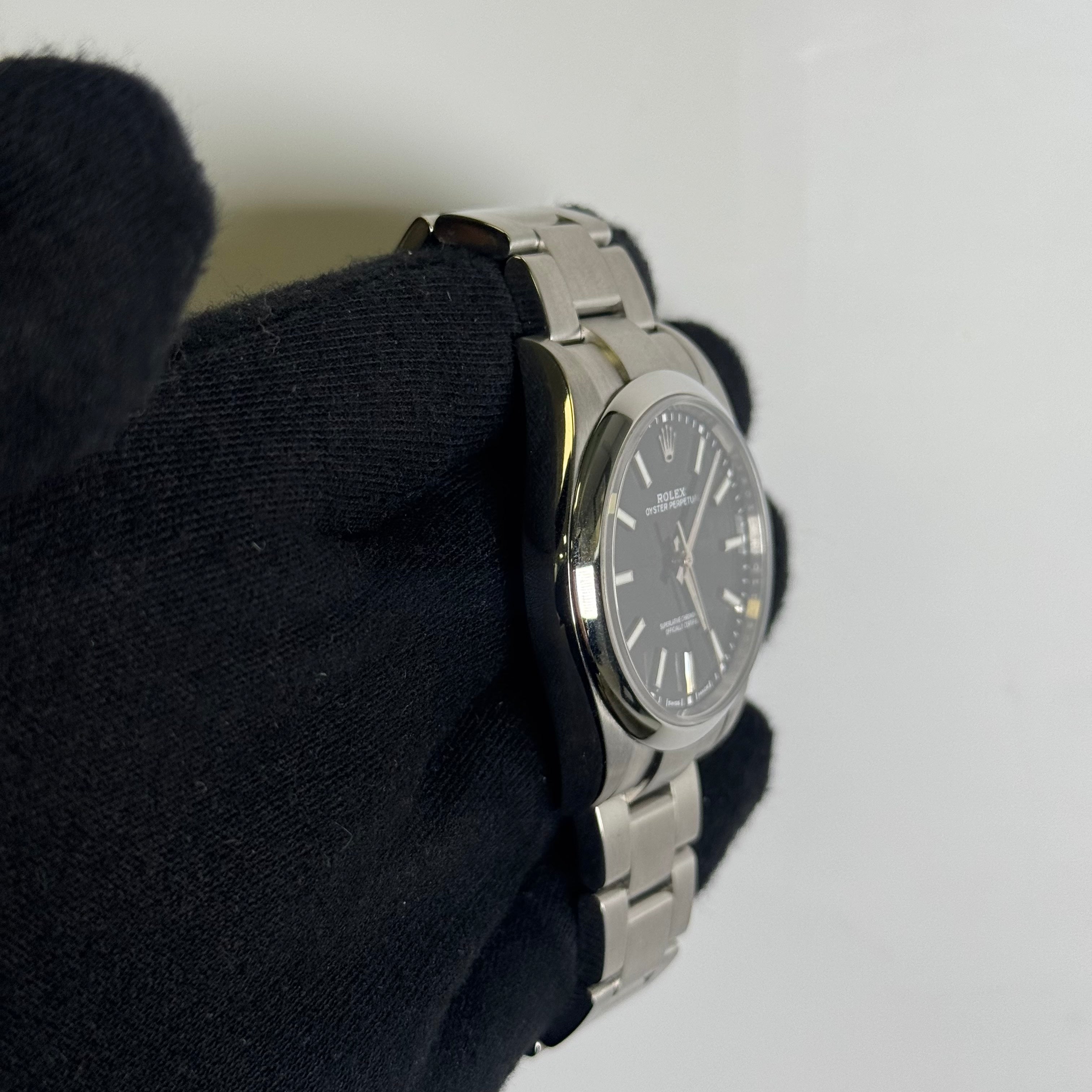 Rolex Oyster Perpetual 39mm Black Dial Watch Ref# 114300 - Happy Jewelers Fine Jewelry Lifetime Warranty