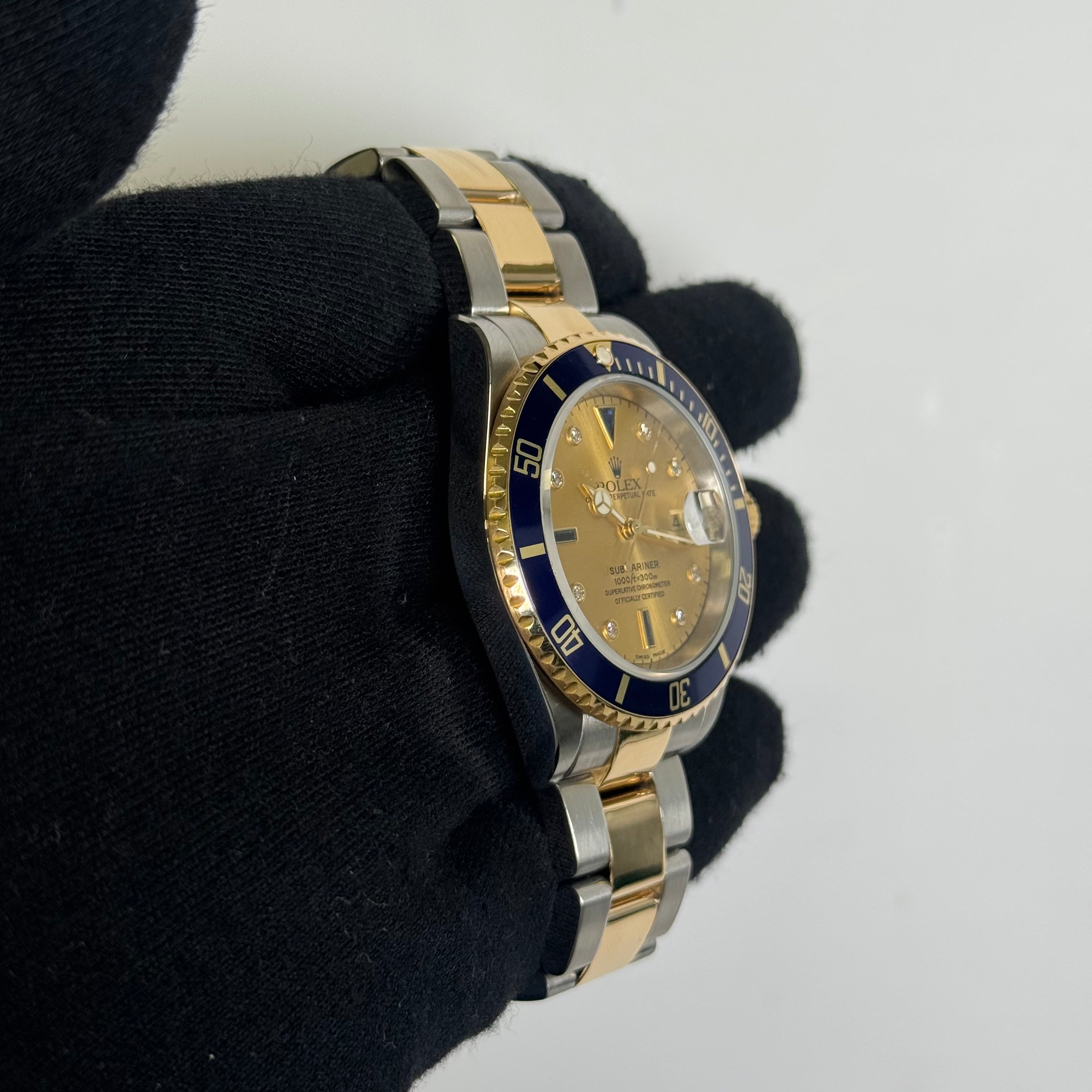 Rolex Submariner 40mm Champagne Dial Watch Ref# 16613 – Happy Jewelers