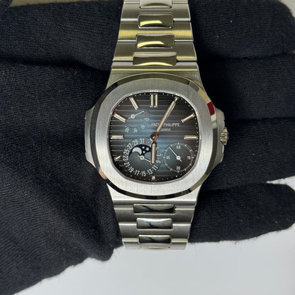Patek Philippe Nautilus 40.5mm Blue Dial Watch Ref# 5712/1A-001 - Happy Jewelers Fine Jewelry Lifetime Warranty
