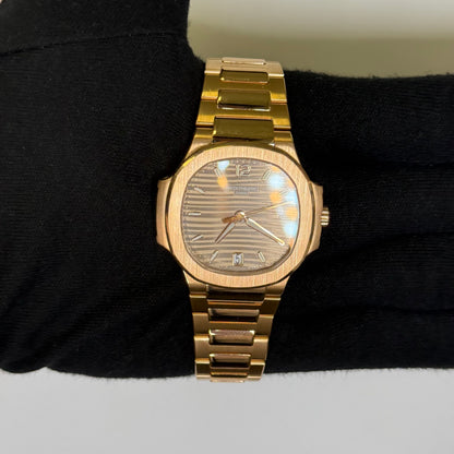 Patek Philippe Nautilus 35mm Champagne Dial Watch Ref# 7118/1R-010 - Happy Jewelers Fine Jewelry Lifetime Warranty