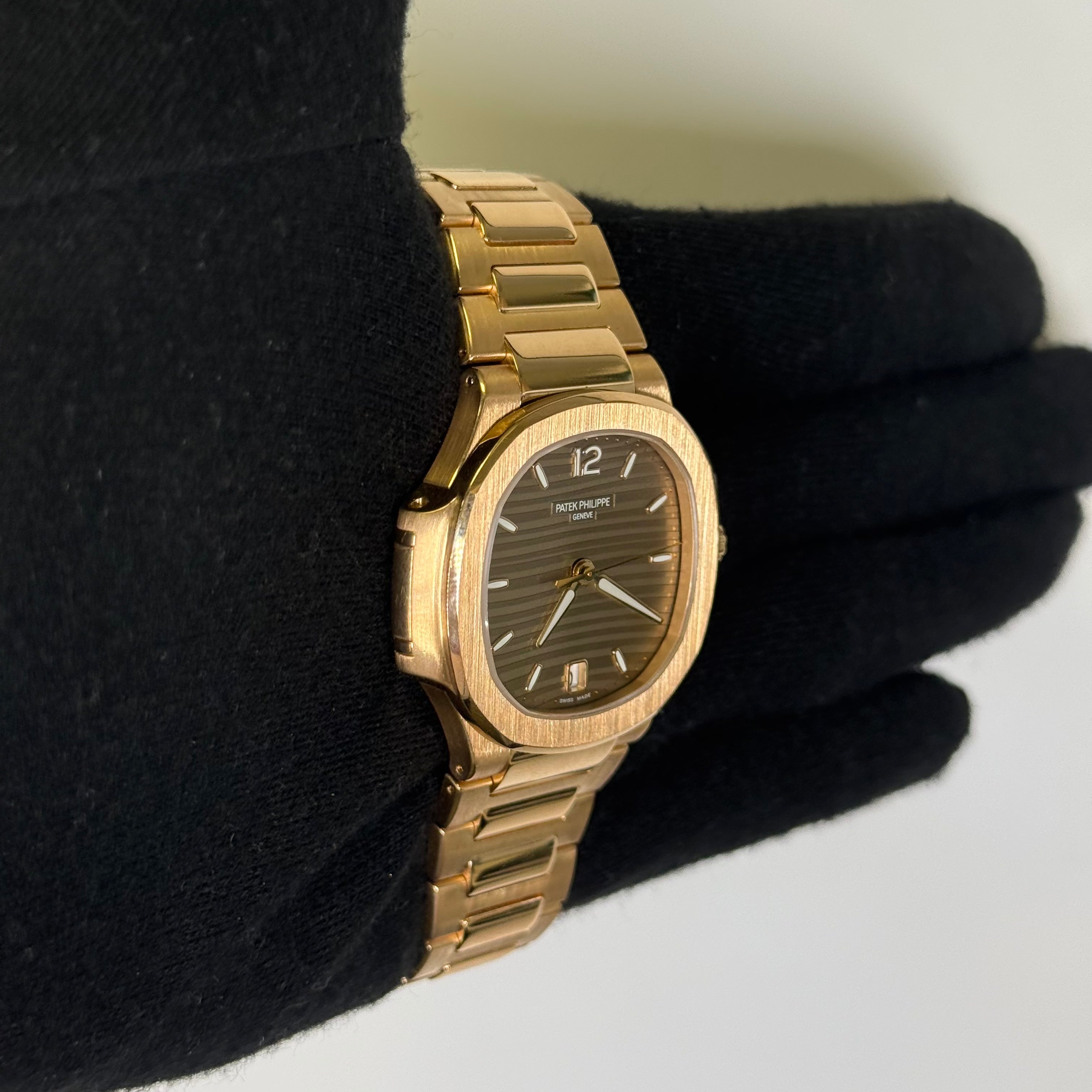 Patek Philippe Nautilus 35mm Champagne Dial Watch Ref# 7118/1R-010 - Happy Jewelers Fine Jewelry Lifetime Warranty