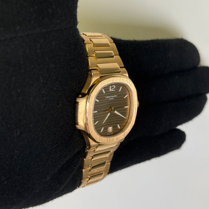 Patek Philippe Nautilus 35mm Champagne Dial Watch Ref# 7118/1R-010 - Happy Jewelers Fine Jewelry Lifetime Warranty