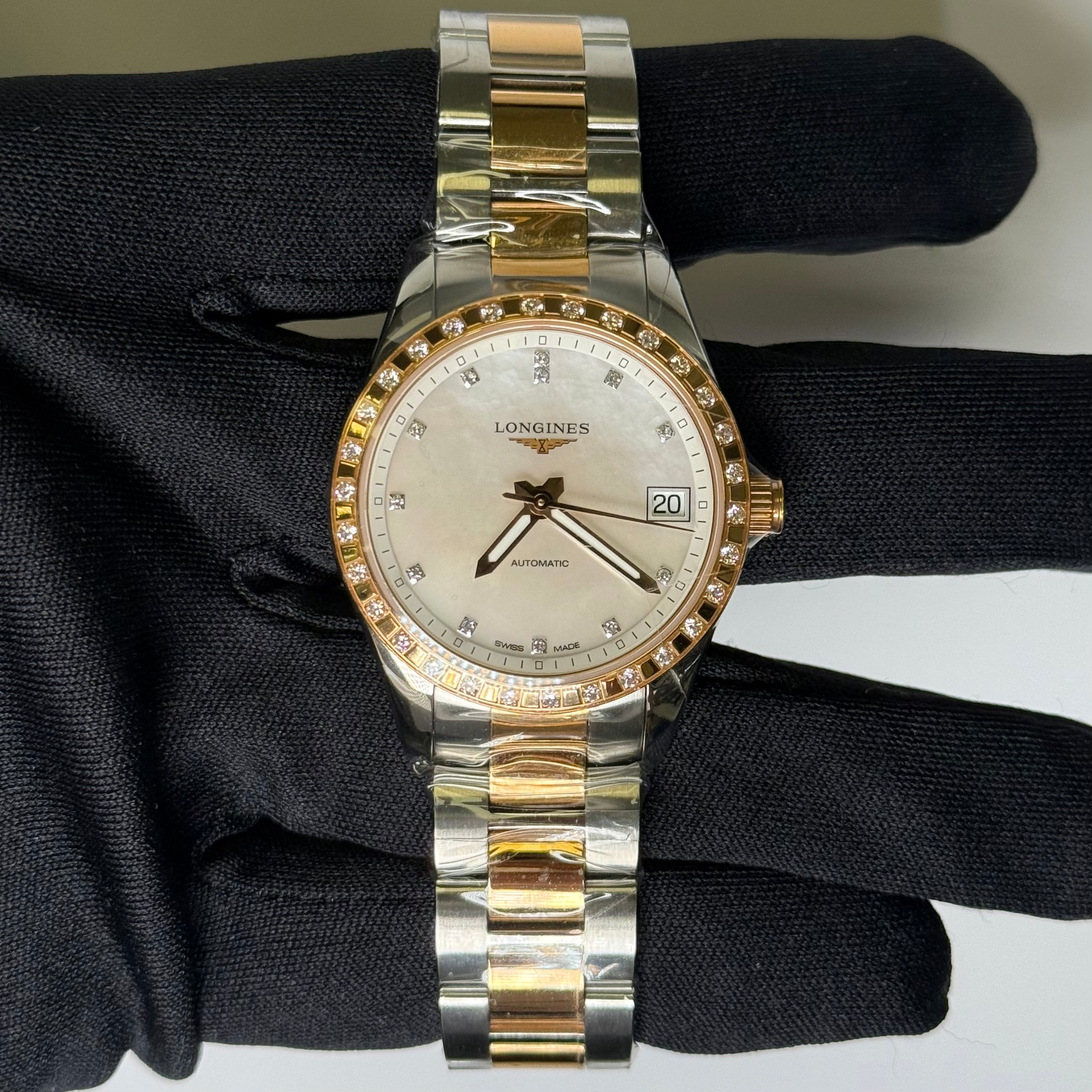 Longines Conquest 34mm MOP Dial Watch Ref#L2.385.5.88.7 - Happy Jewelers Fine Jewelry Lifetime Warranty