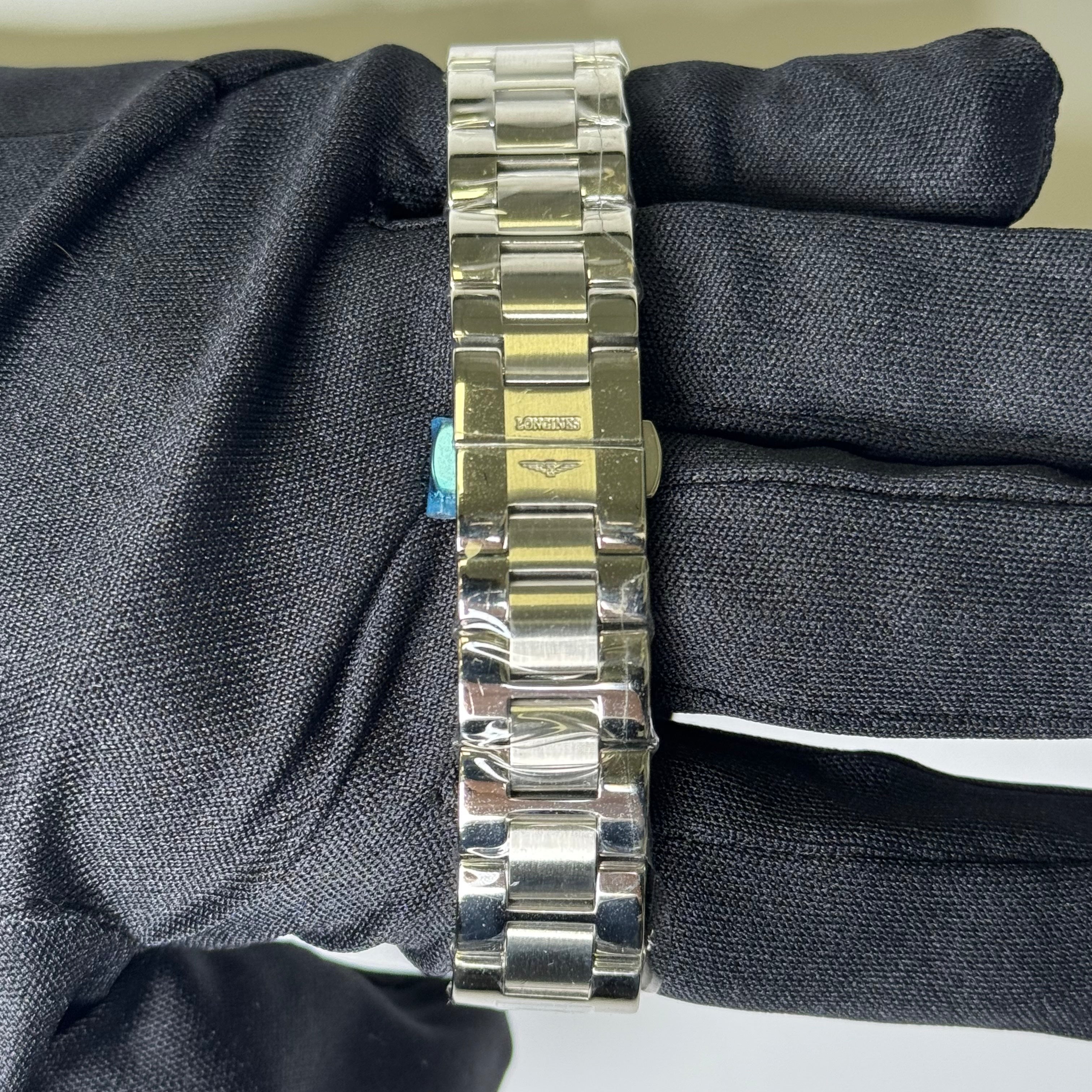 Longines Conquest 34mm Mother of Pearl Dial Watch Ref#L2.385.0.87.6 - Happy Jewelers Fine Jewelry Lifetime Warranty