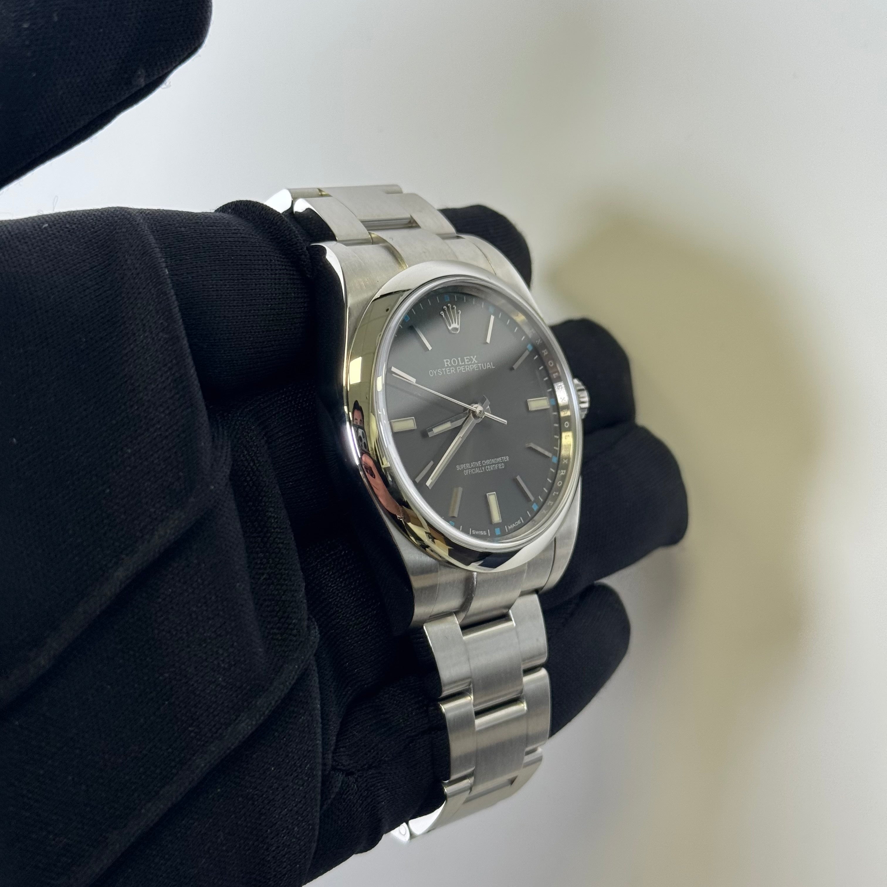 Rolex Oyster Perpetual 39mm Rhodium Dial Watch Ref# 114300 – Happy