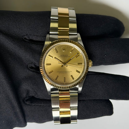 Rolex Oyster Perpetual 34mm Champagne Dial Watch Ref# 14233