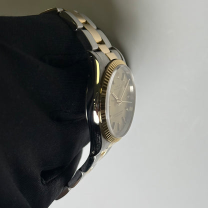 Rolex Oyster Perpetual 34mm Champagne Dial Watch Ref# 14233