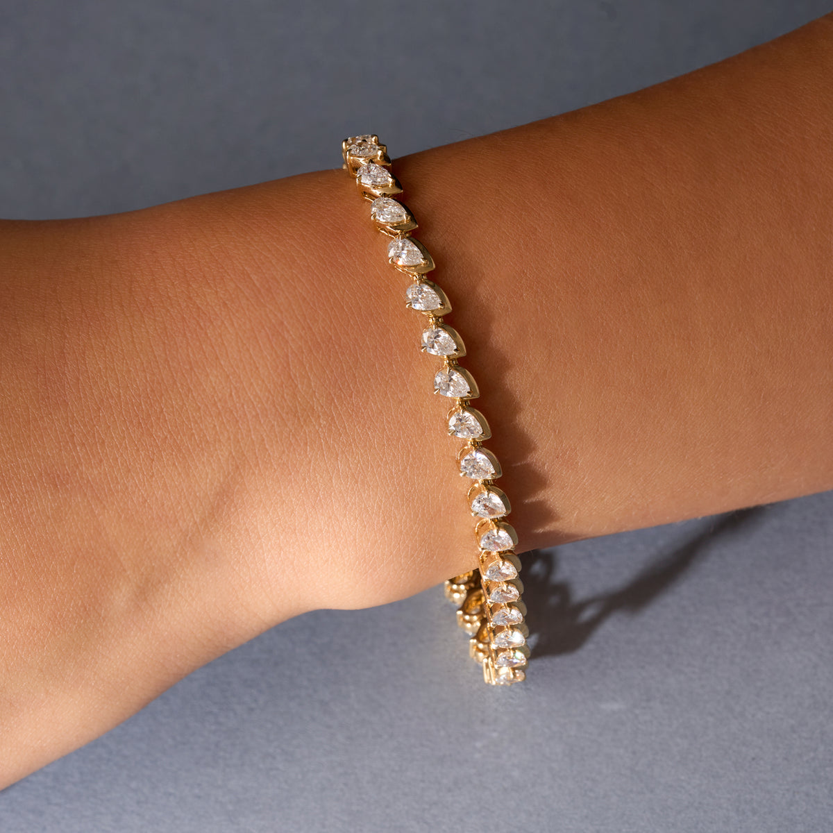 Slanted Pear Natural Diamond Floating Tennis Bracelet