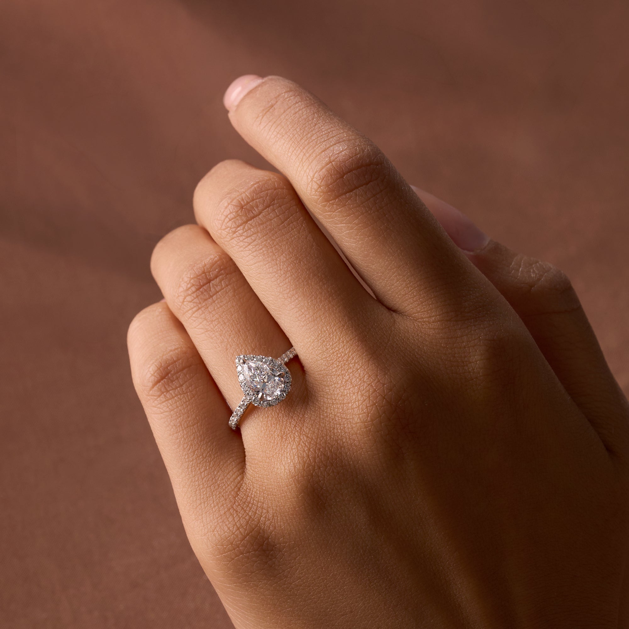 1.01 Pear Cathedral Halfway Pave Engagement Ring