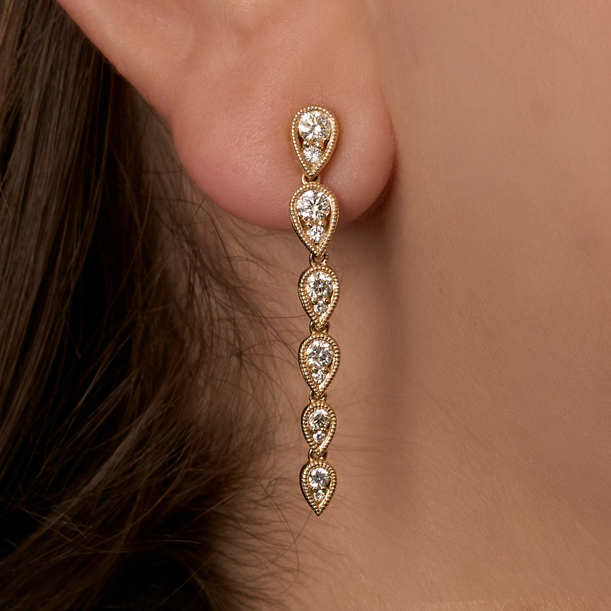 Diamond Pear Illusion Graduated Drop Earrings