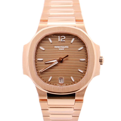 Patek Philippe Nautilus 35mm Champagne Dial Watch Ref# 7118/1R-010 - Happy Jewelers Fine Jewelry Lifetime Warranty