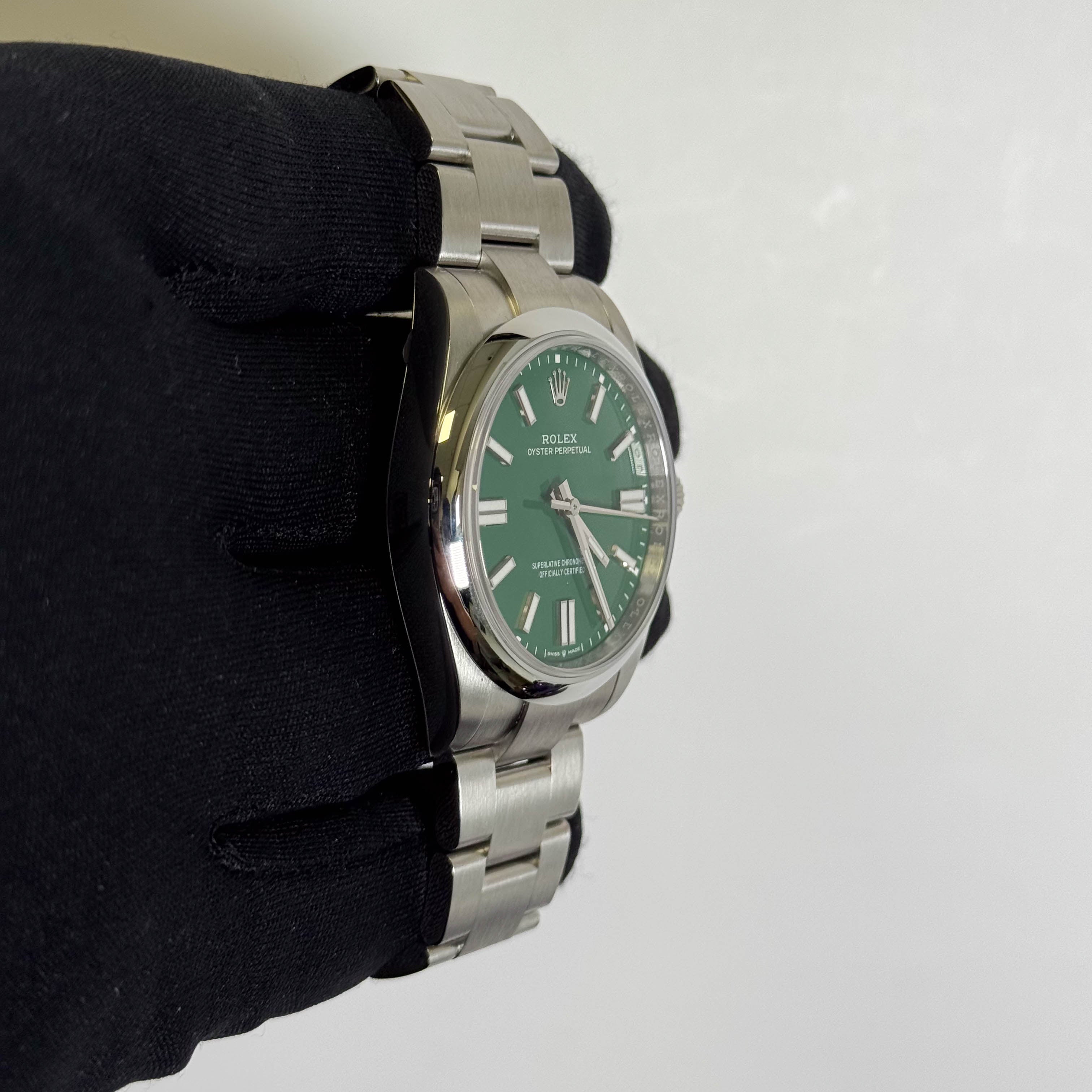 Rolex Oyster Perpetual 41mm Green Dial Watch Ref# 134300