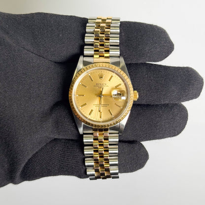 Rolex Oyster Perpetual Date 34mm Champagne Dial Watch Ref: 15223