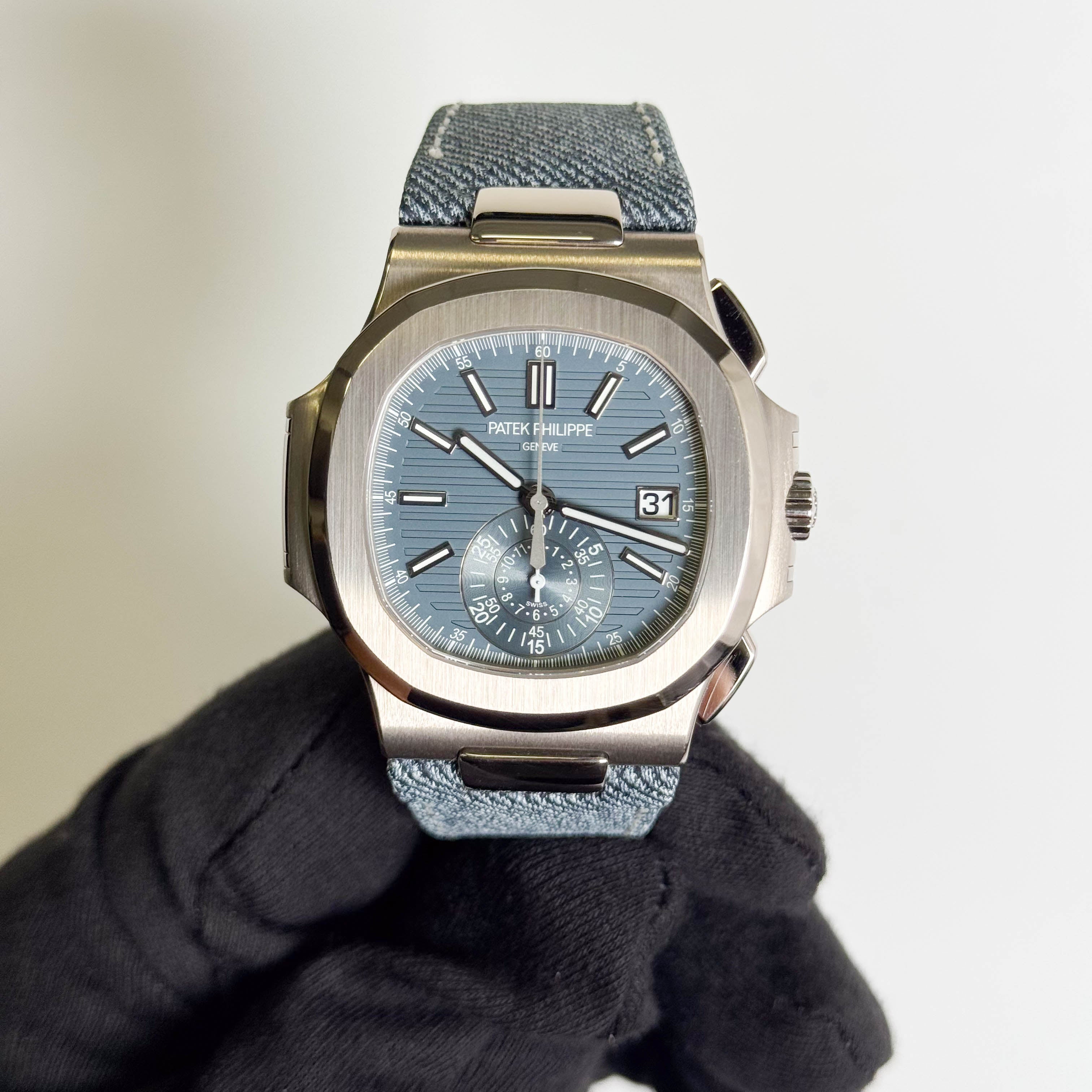 Patek Philippe Nautilus 40.5mm Blue Stick Dial Watch Ref# 5980/60G-001
