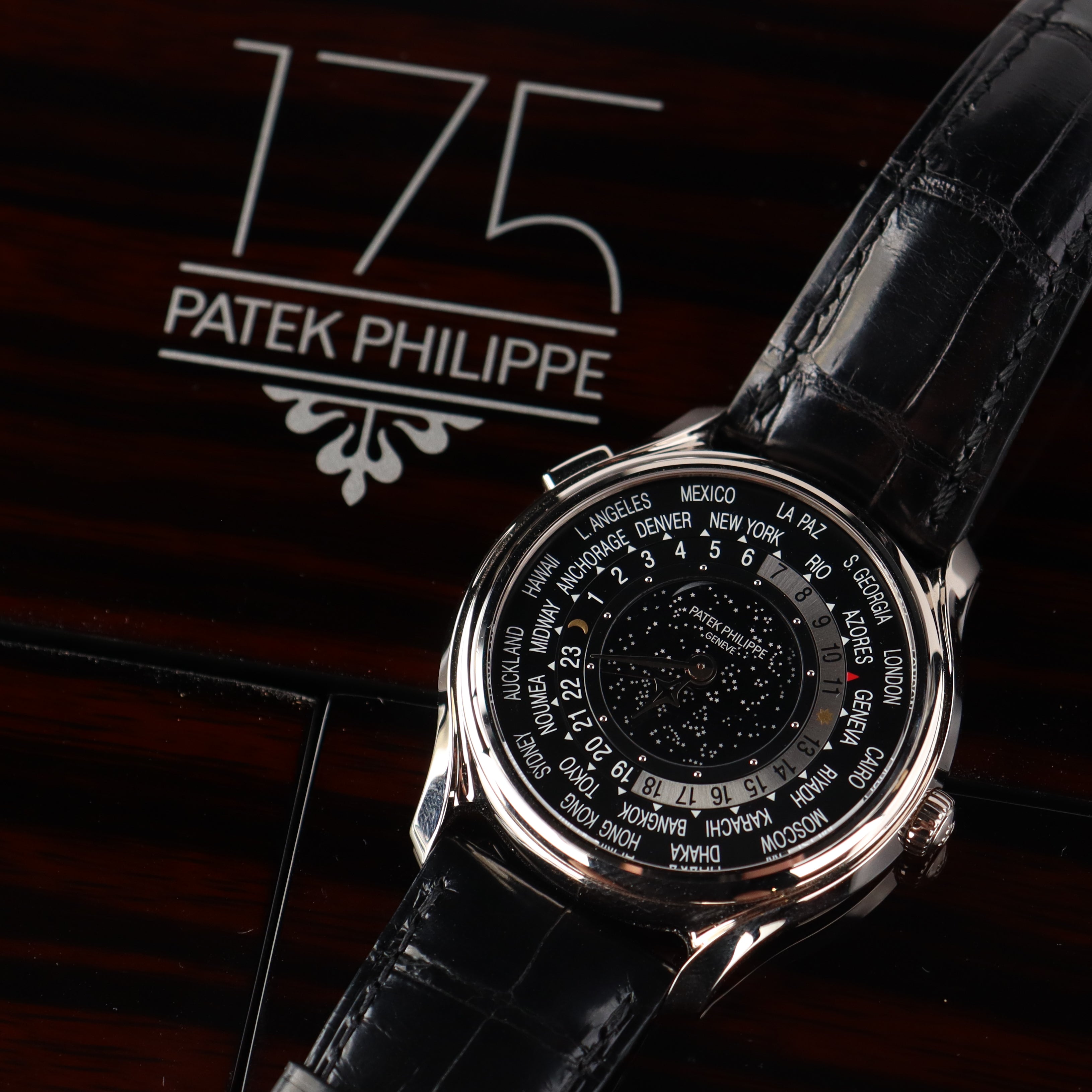 Patek Philippe World Time 40mm Black Dial Watch Ref# 5575G-001 - Happy Jewelers Fine Jewelry Lifetime Warranty