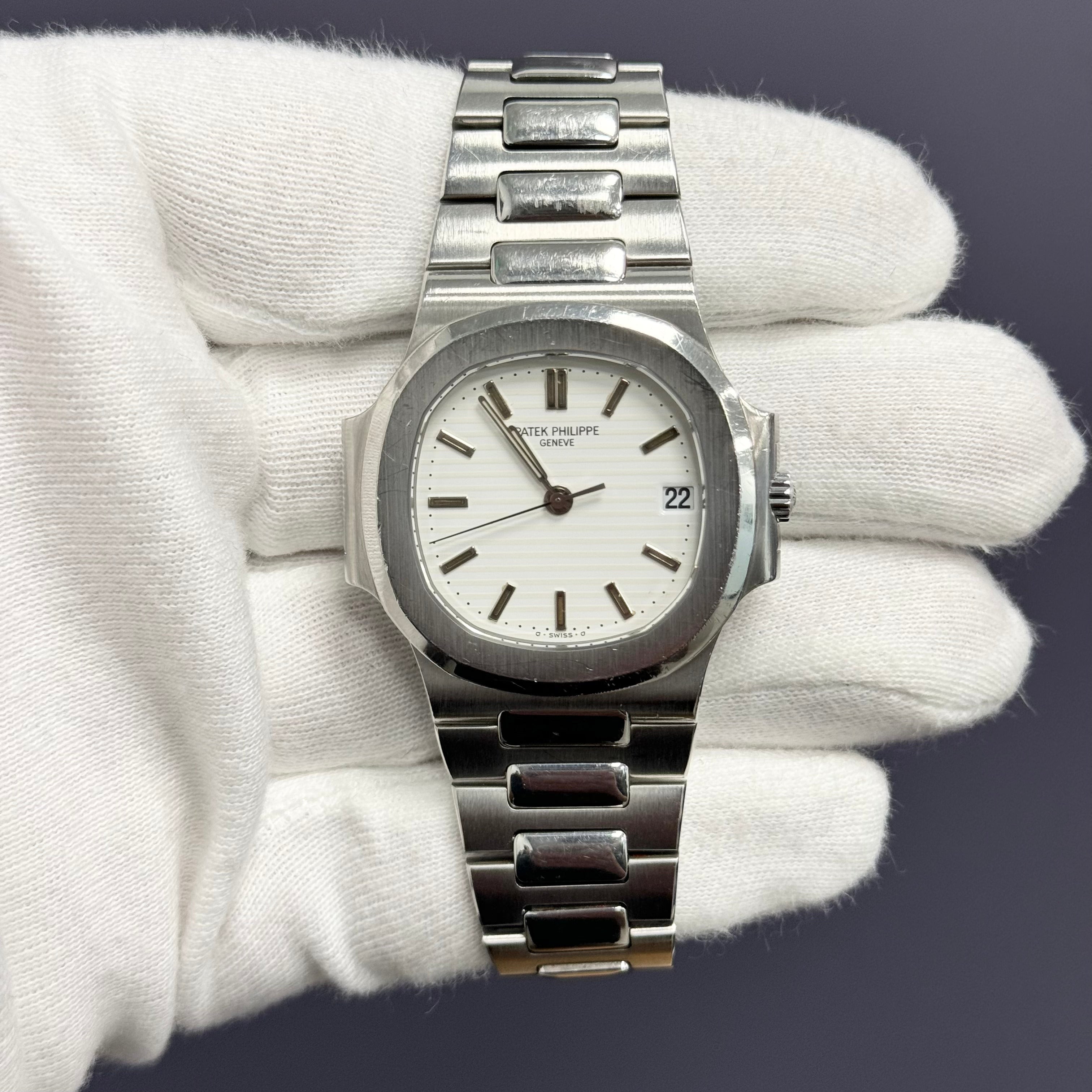 Patek Philippe Nautilus 37.5mm White Stick Dial Watch Ref# 3800 - Happy Jewelers Fine Jewelry Lifetime Warranty