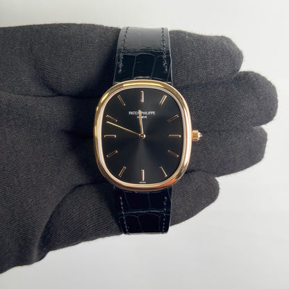 Patek Philippe Golden Ellipse 34.5x39.5mm Black Dial Watch Ref# 5738R-001