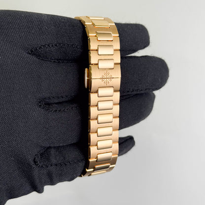 Patek Philippe Nautilus 35mm Rose Dial Watch Ref# 7118/1300R-001