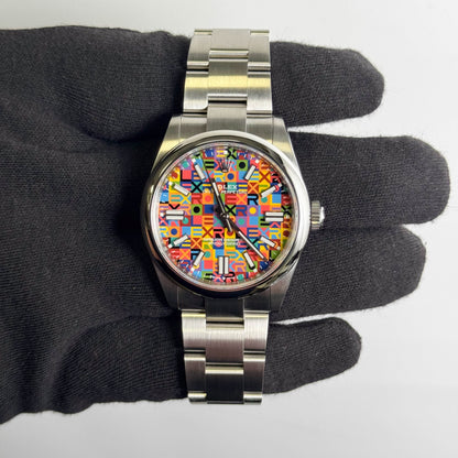 Rolex Oyster Perpetual 41mm Multicolored Jubilee Motif Dial Watch Ref# 134300
