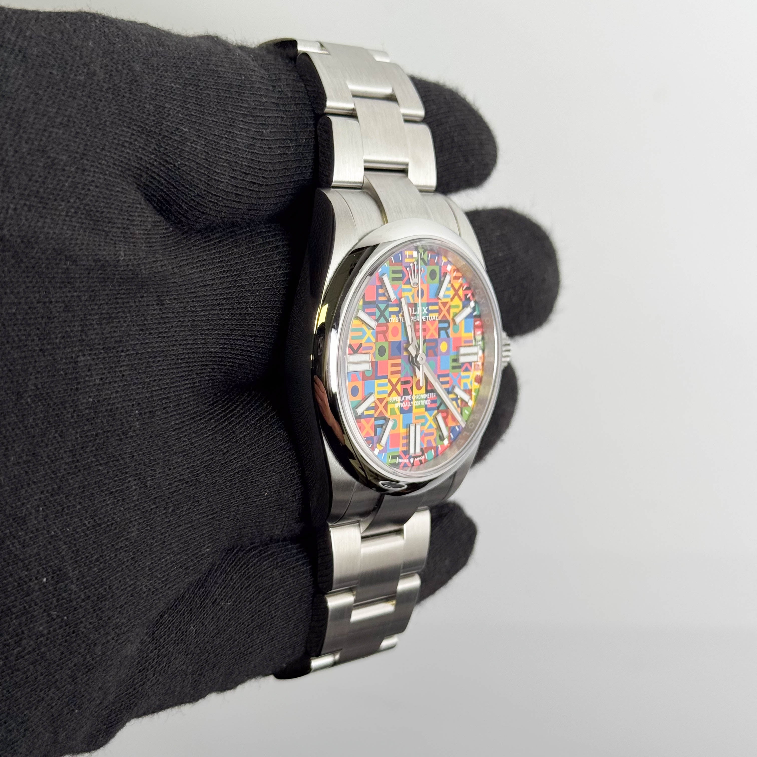 Rolex Oyster Perpetual 41mm Multicolored Jubilee Motif Dial Watch Ref# 134300