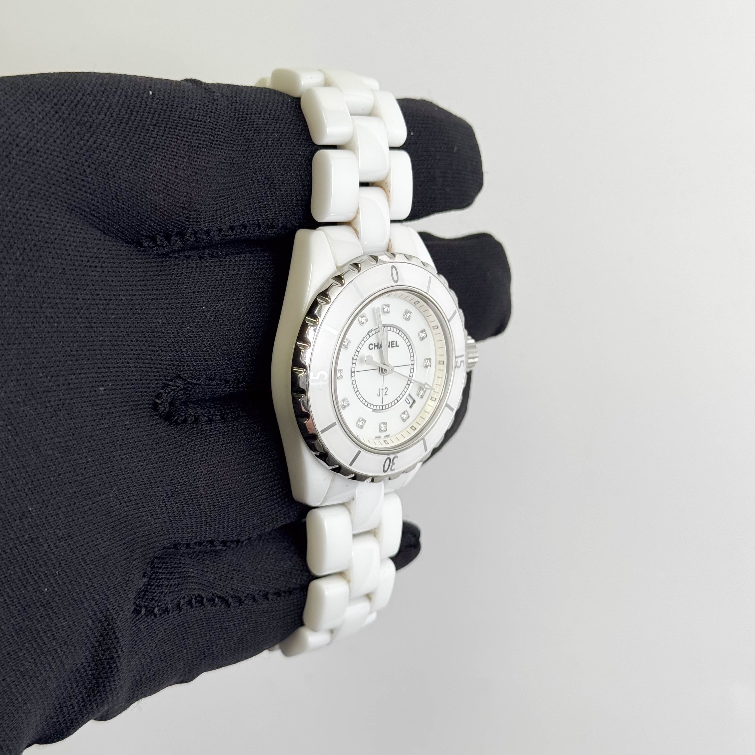 Chanel J12 33mm White Dial Watch Ref# H1628 – Happy Jewelers