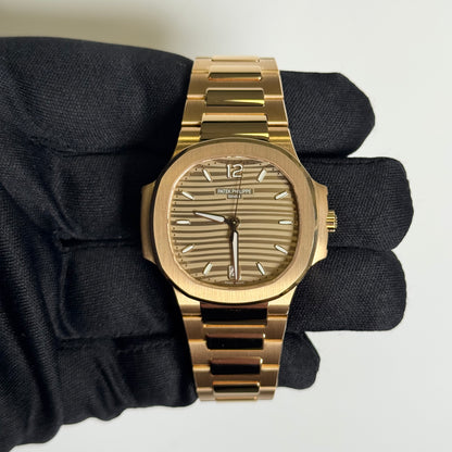 Patek Philippe Nautilus 35mm Champagne Dial Watch Ref# 7118/1R-010 - Happy Jewelers Fine Jewelry Lifetime Warranty