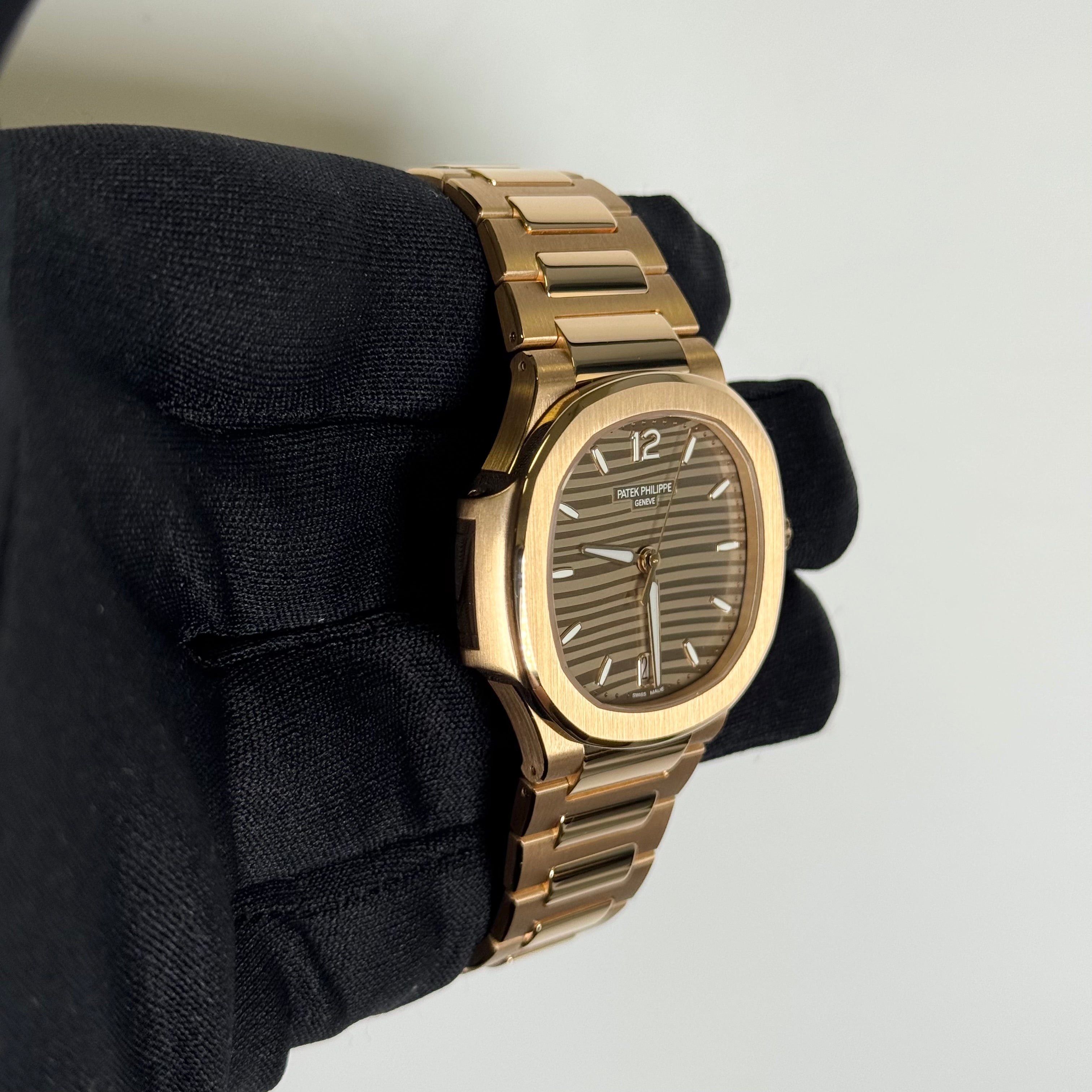 Patek Philippe Nautilus 35mm Champagne Dial Watch Ref# 7118/1R-010 - Happy Jewelers Fine Jewelry Lifetime Warranty