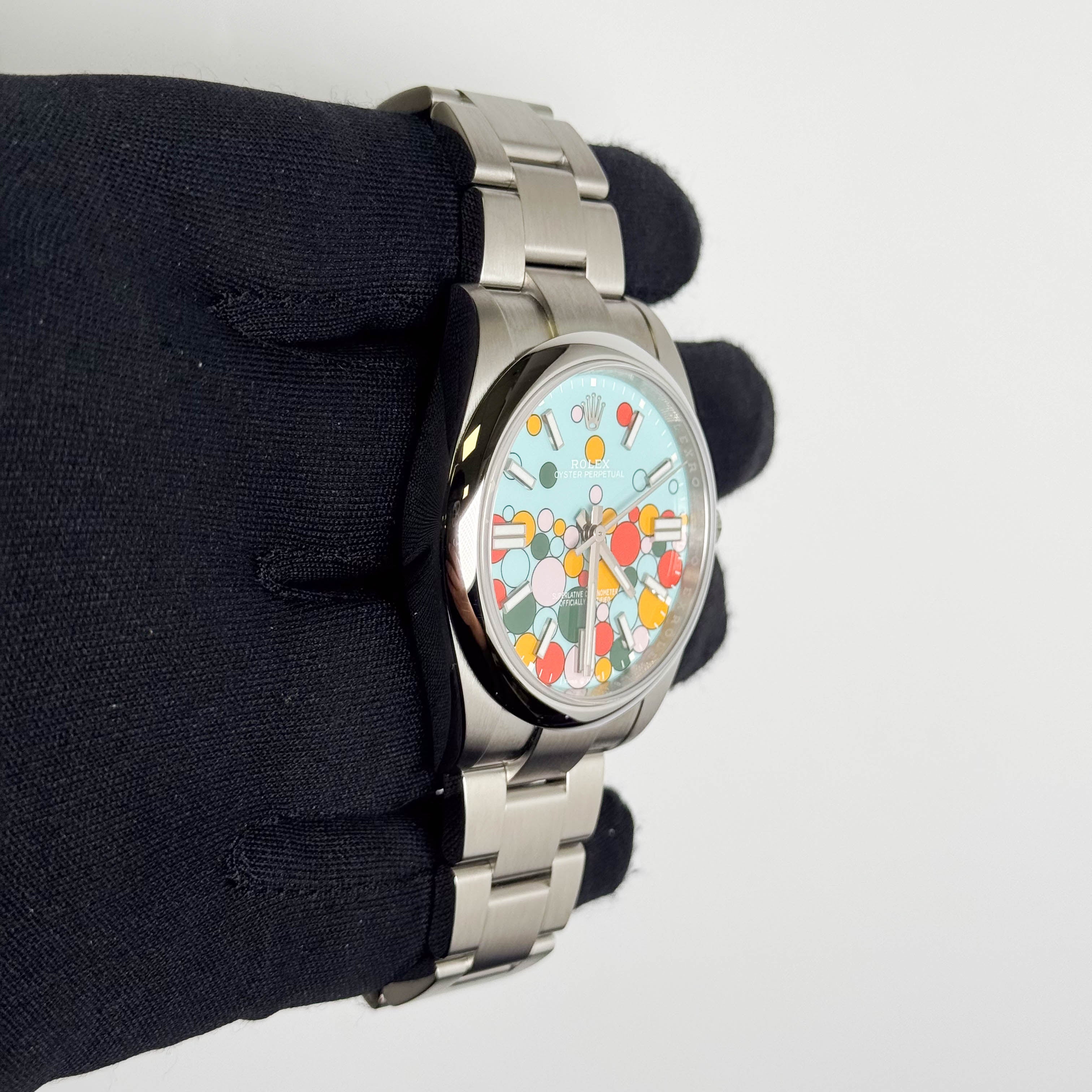 Rolex Oyster Perpetual 41mm Celebration Dial Watch Ref# 124300 - Happy Jewelers Fine Jewelry Lifetime Warranty