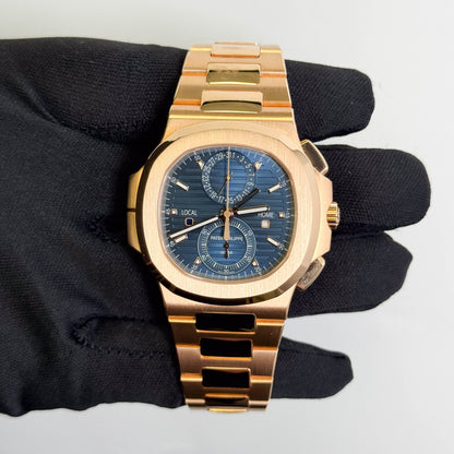 Patek Philippe Nautilus 40.5mm Blue Stick Dial Watch Ref# 5990/1R-001
