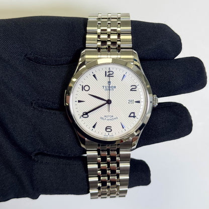 Tudor 1926 White Dial with Blue stick and Arabic Numbers Watch Ref# 91650 - Happy Jewelers Fine Jewelry Lifetime Warranty