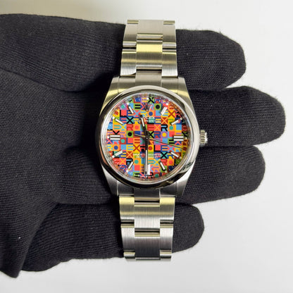 Rolex Oyster Perpetual 36mm 100  Multicolored Jubilee Motif Dial Watch Ref# 126000