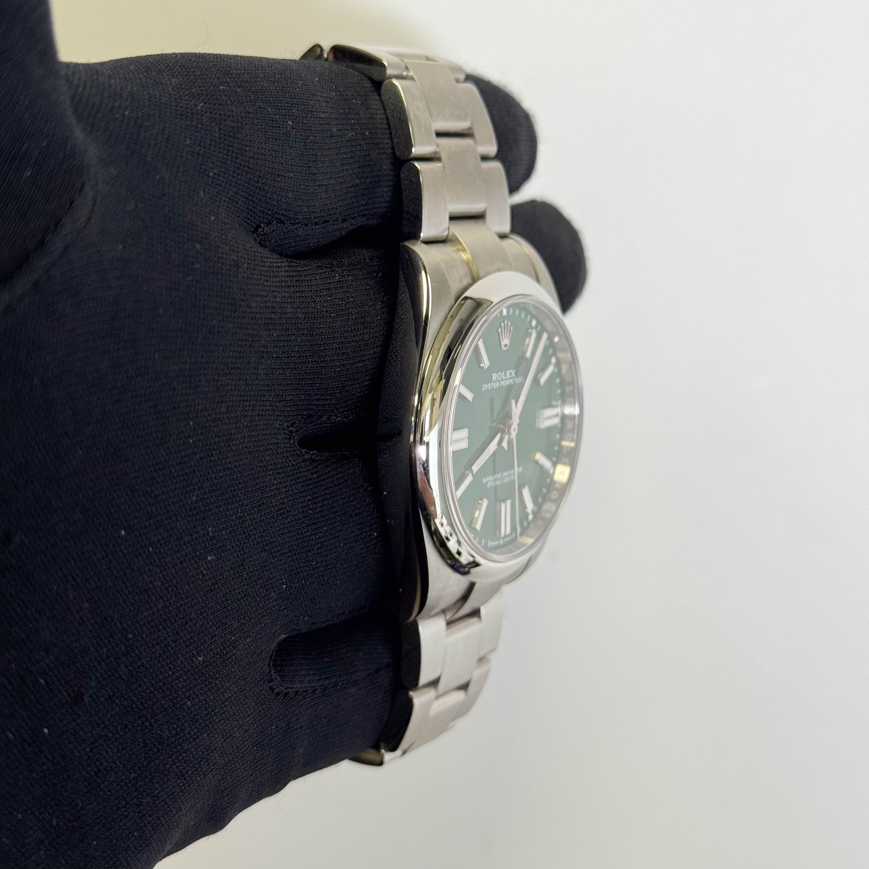 Rolex Oyster Perpetual 41mm Green Dial Watch Ref# 124300 - Happy Jewelers Fine Jewelry Lifetime Warranty