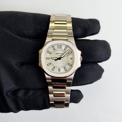 Patek Philippe Nautilus 31mm White Dial Watch Ref# 7011/1G-001