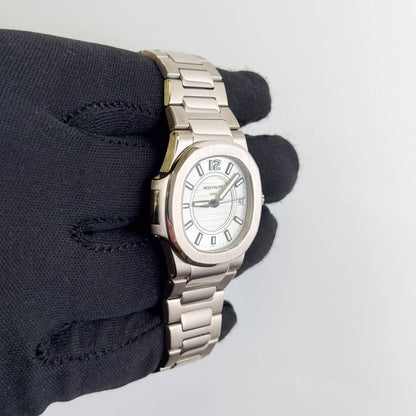 Patek Philippe Nautilus 31mm White Dial Watch Ref# 7011/1G-001
