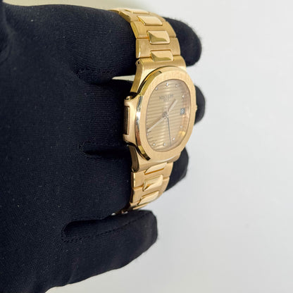 Patek Philippe Nautilus 38mm Champagne Dial Watch Ref# 3800/1J - Happy Jewelers Fine Jewelry Lifetime Warranty